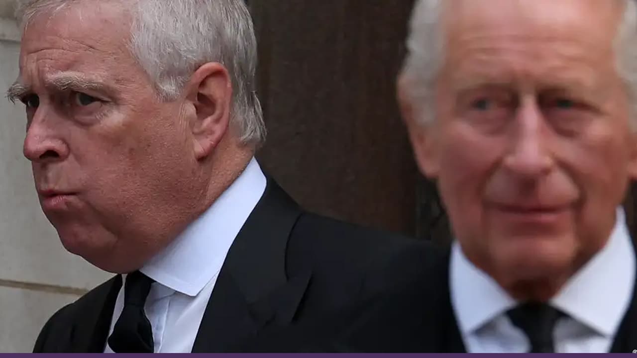 Two elderly men in black suits walking outdoors together