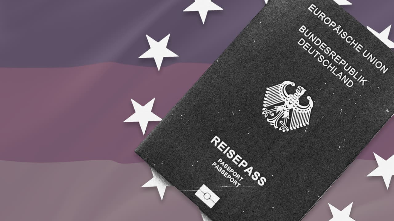 German passport on a background of the European Union flag with stars, illustrating the process of obtaining German citizenship