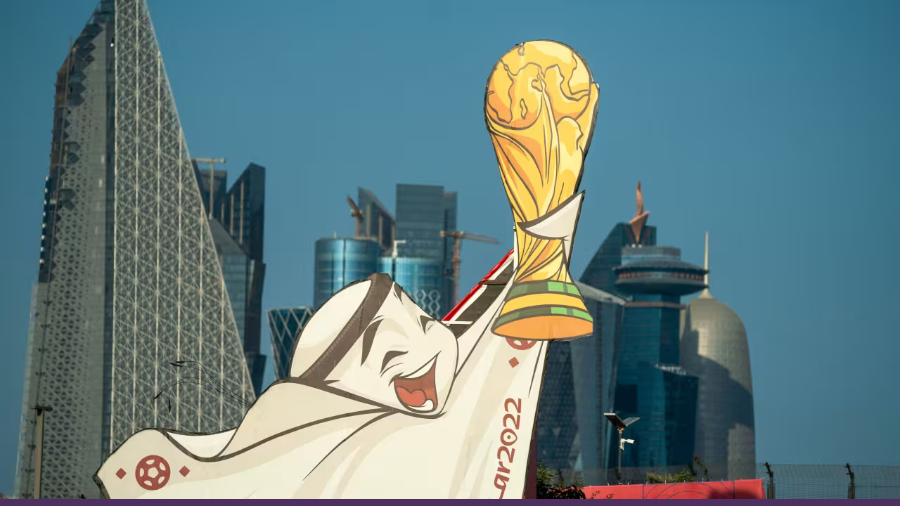 Qatar 2022 mascot La’eeb holding the prestigious trophy at the Qatar 2022 FIFA World Cup